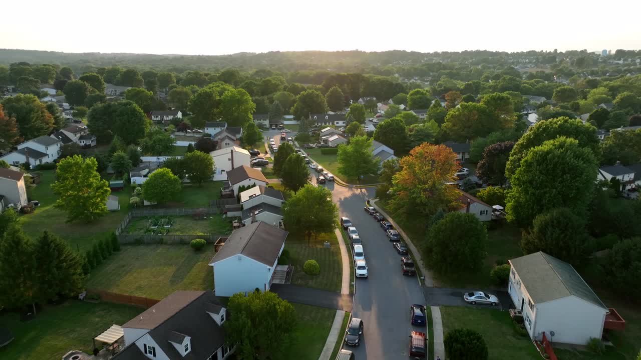 Cars parked along street in residential neighborhood in USA