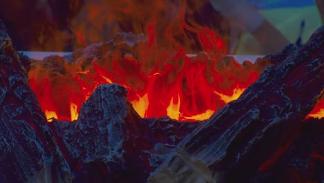 artificial safe fireplace close-up. flame of the fire of an artificial fireplace. electric fireplace