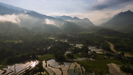 Paddy-fiends-nestled-in-rugged-mountainous-karst-landscape-of-Ha-Giang,-northern-Vietnam