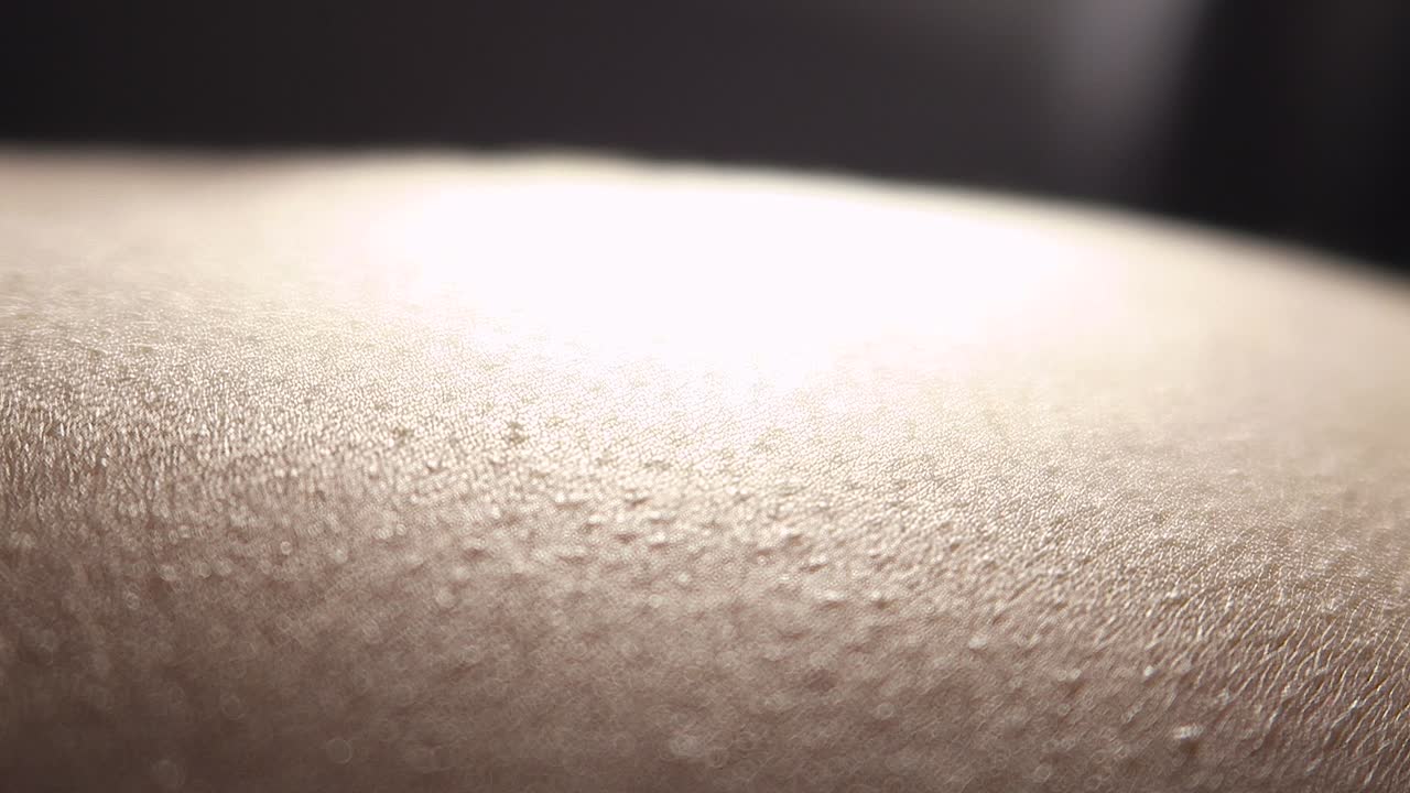 Hand running down the back.