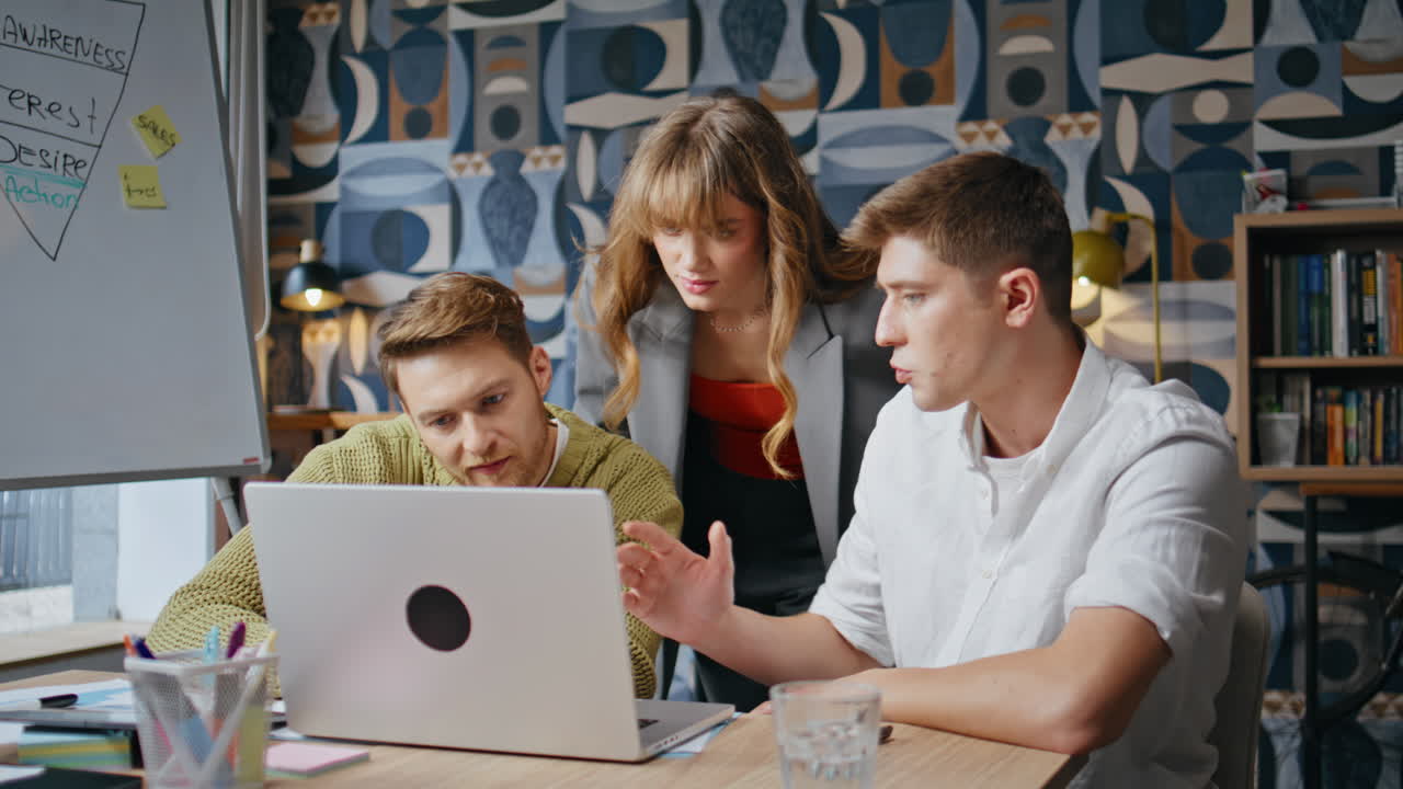 Creative team cooperating office boardroom discussing business ideas closeup
