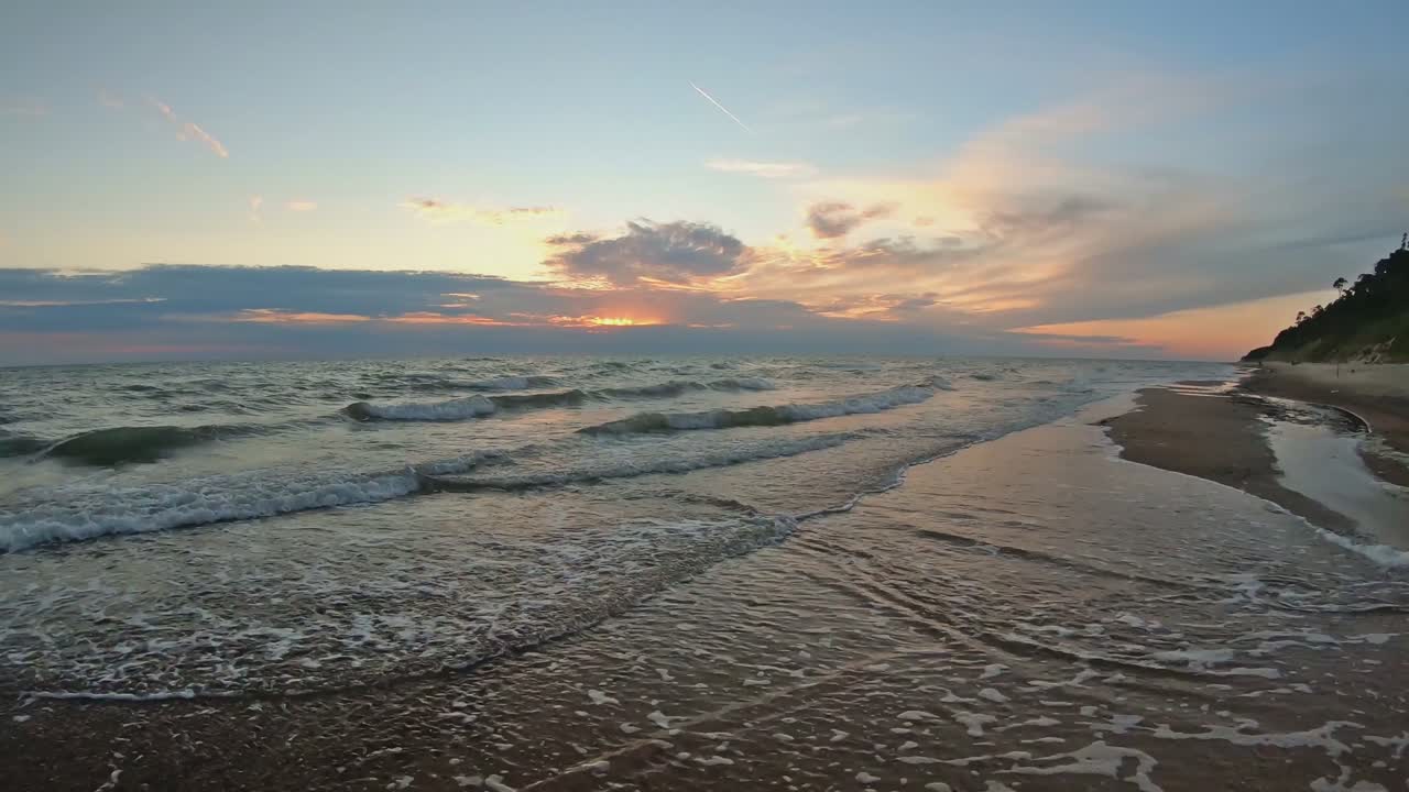 Sandy Beaches of the Baltic Sea at Sunset. Time Warp Lapse