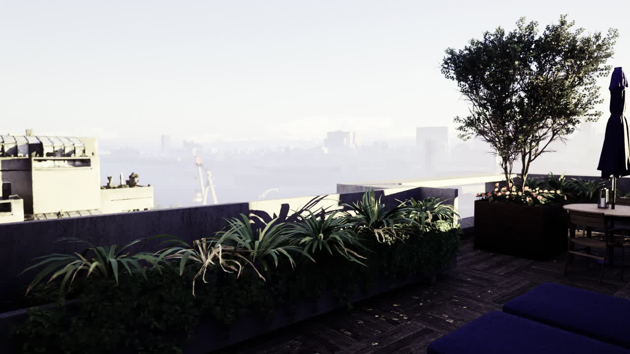 Rooftop lounge with lush greenery overlooking a foggy cityscape at sunrise