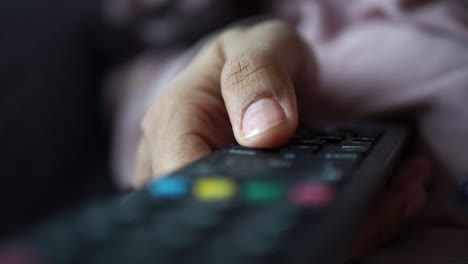 hand holding a tv remote