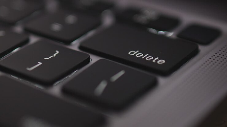 4K Video slow motion close up finger click delete button.