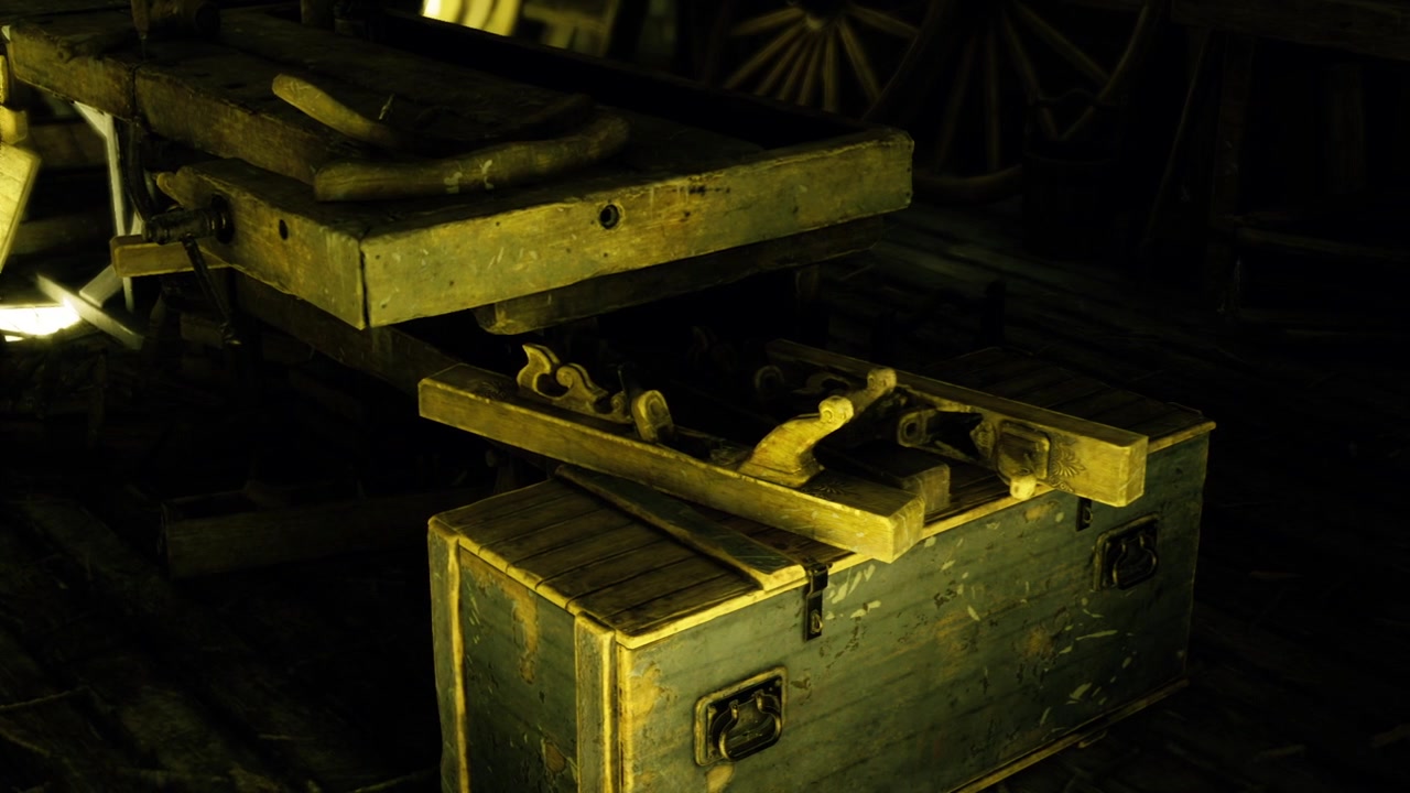 Old vintage toolbox filled with various manual tools under warm lighting