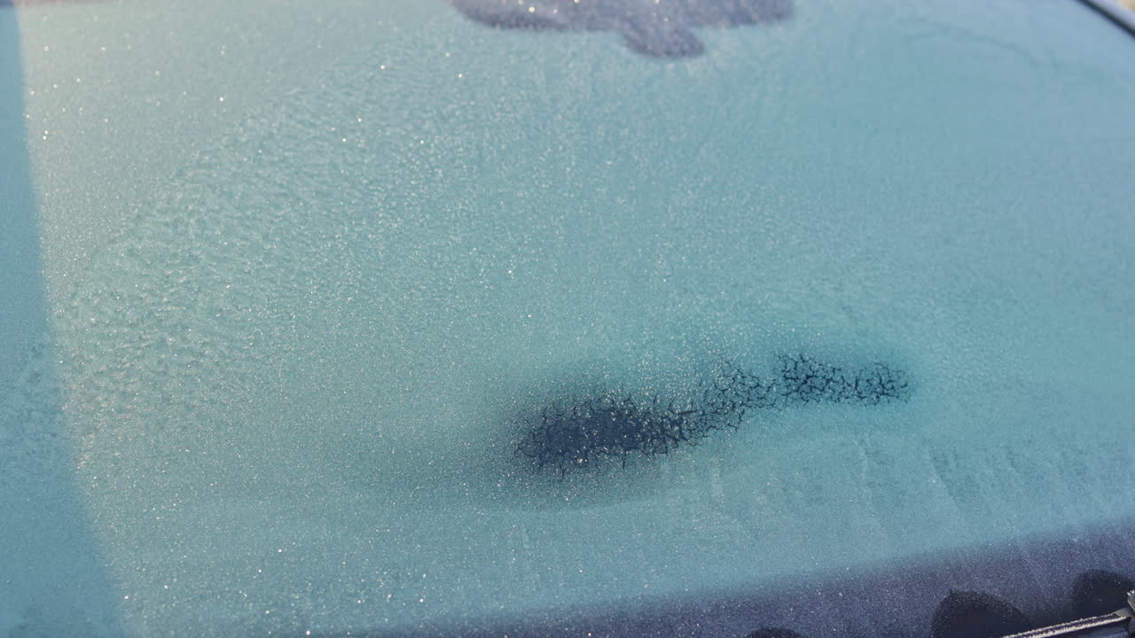Frost on Windshield Creating a Beautiful Winter Wonderland Visual Effect in Nature