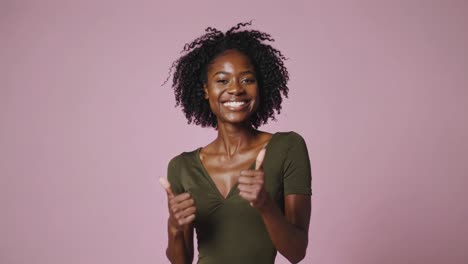 happy woman giving a thumbs up