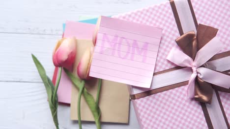 mother's day gift with pink box and tulips