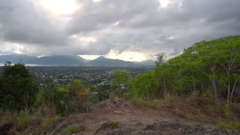 man walking in from right hand side to look at view.