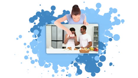 Young-woman-pointing-at-a-couple-in-a-kitchen