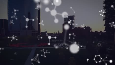 animation of shapes moving over cityscape