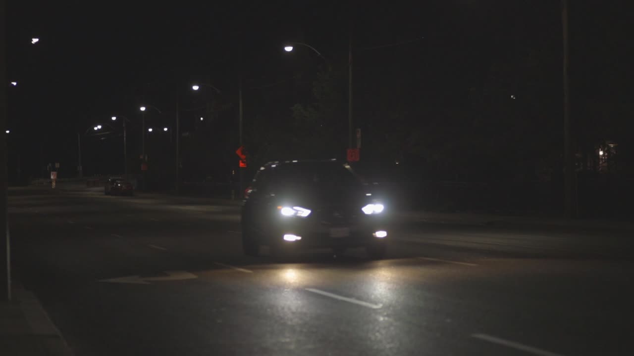 Cars Driving On The Motorway At Midnight. - wide shot
