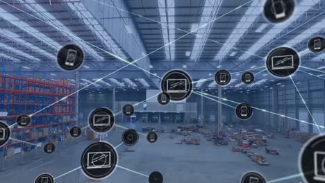 animation of network of digital icons against aerial view of warehouse