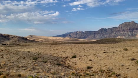 red rock canyon and visitor center with mountain panorama