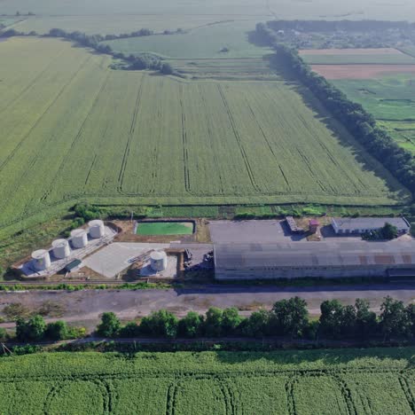 aerial view of oil storage facility in a sunflower field