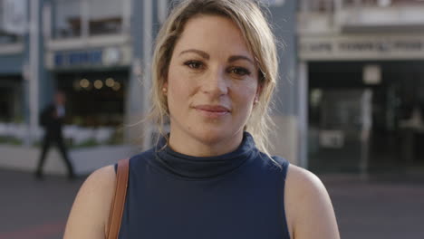 slow motion portrait of successful blonde business woman looking pensive thoughtful at camera