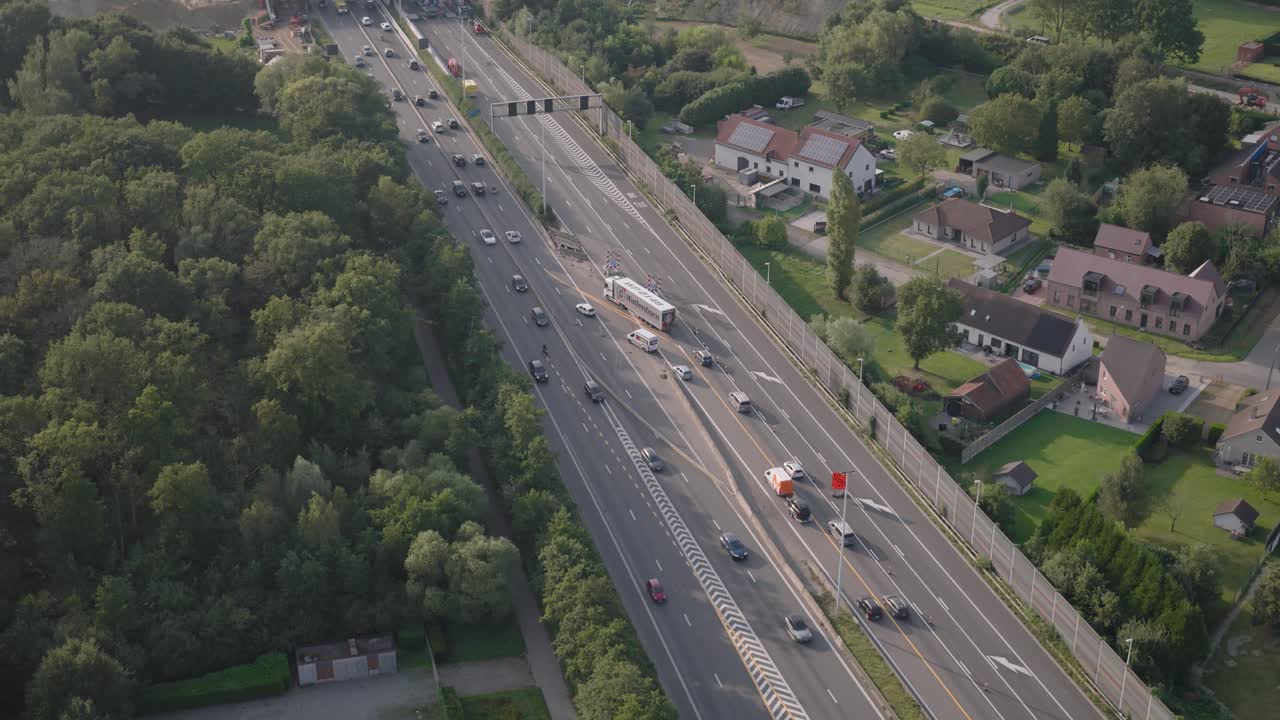 Busy highway road with constructions, aerial drone view