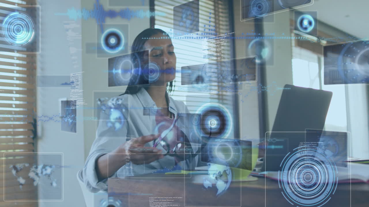 Interacting with animation holograms, businesswoman at office desk analyzing data