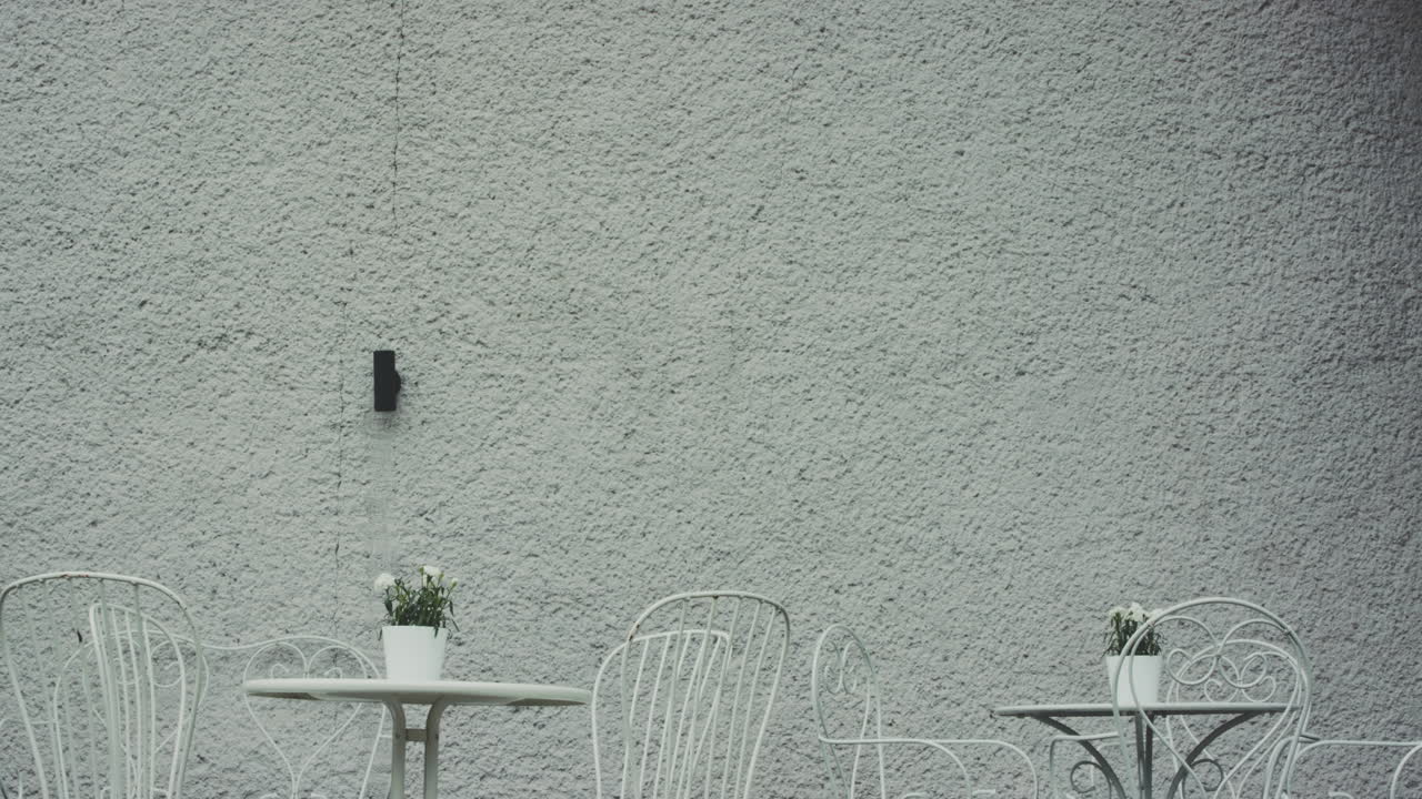 Close-Up of Metal Tables and Chairs