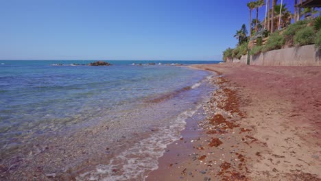 waves washing the shore in mijas costa