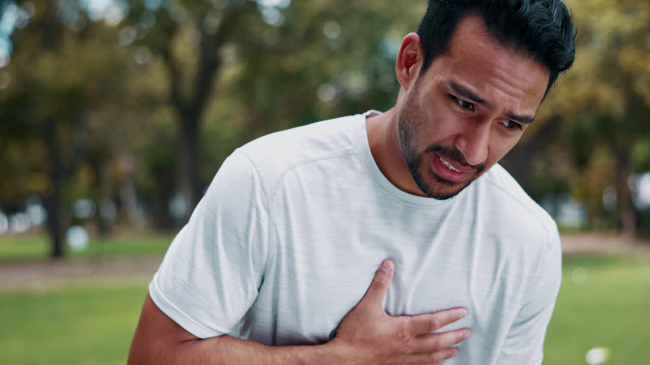 Chest pain, park and man with fitness injury