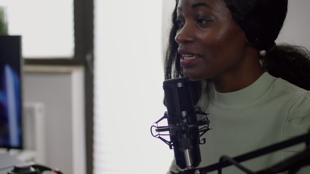 Portrait of african cyber talking on stream chat with players