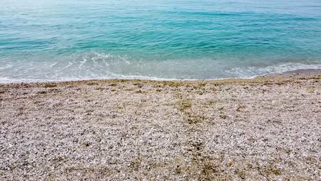 the waves hitting the shore on the albanian riviera