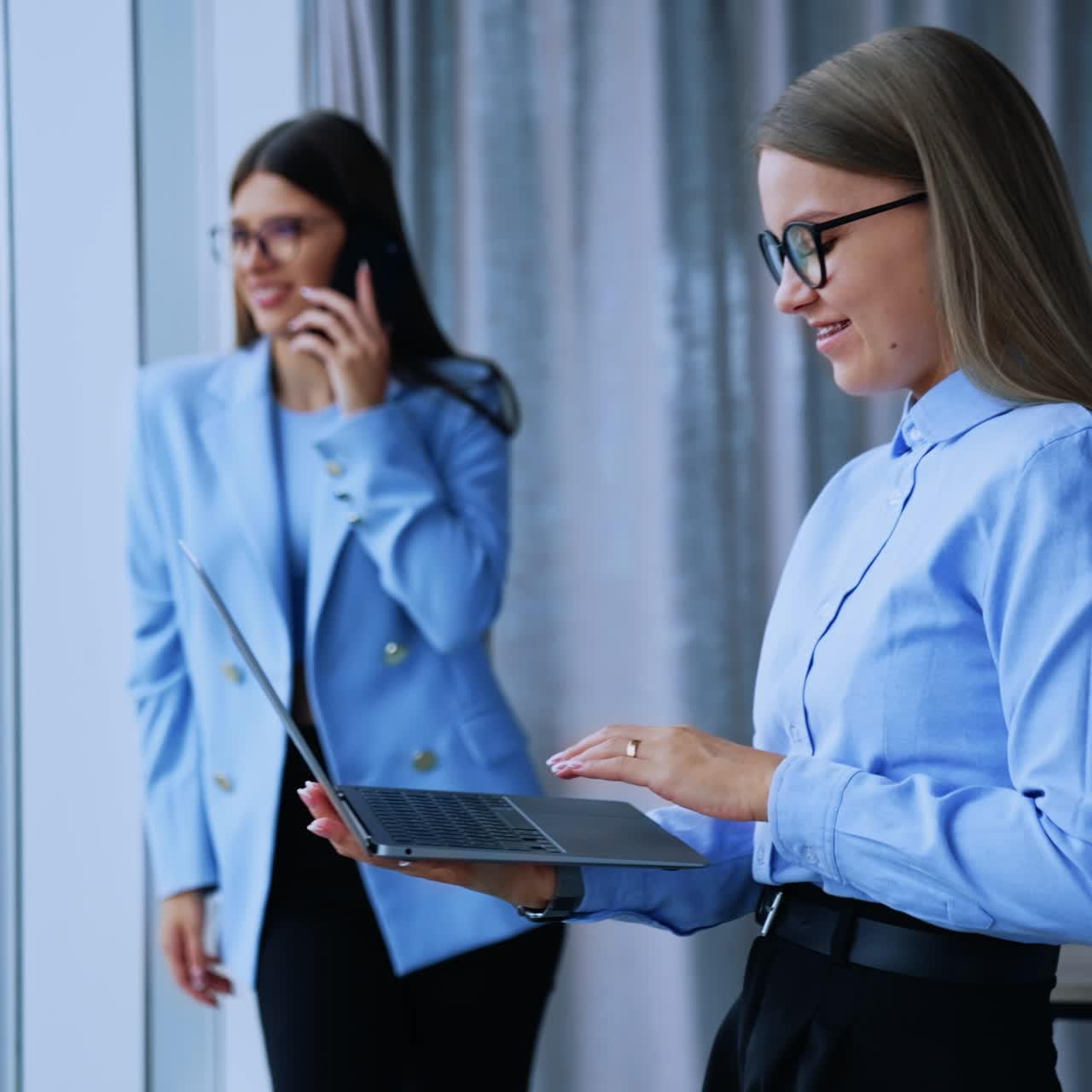 Beautiful young woman engaged in business. Pretty female business managers