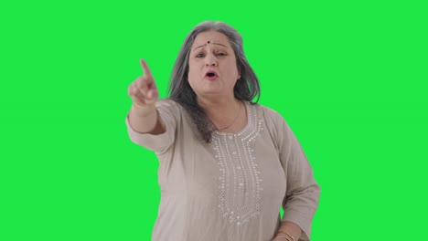 Frustrated-Indian-old-woman-shouting-at-someone-Green-screen