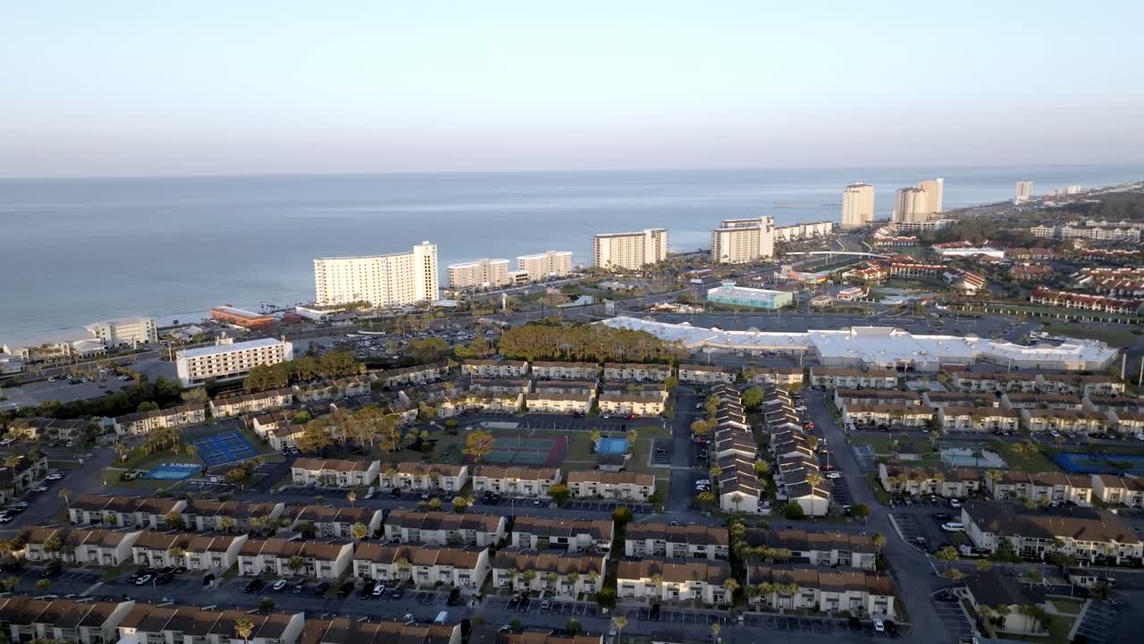 Condos, homes and hotels in Panama City Beach, Florida with drone video shot in a circle wide.