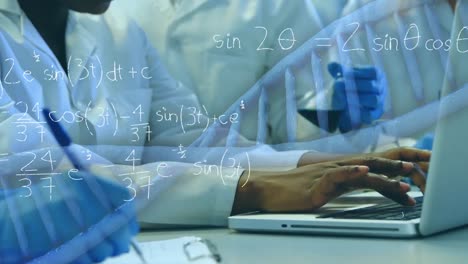 animation of dna strand spinning with calculations on female lab worker using laptop in background.