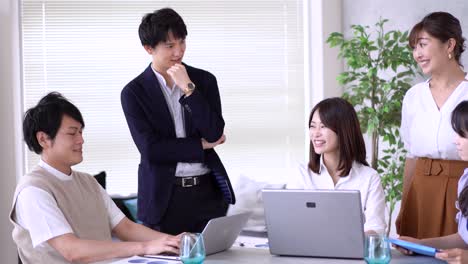 business persons working in an office