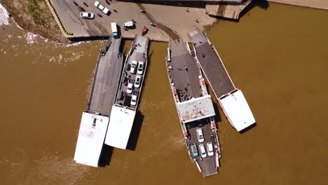 cargo transport ferry mekong river phnom penh pier cambodia aerial drone view