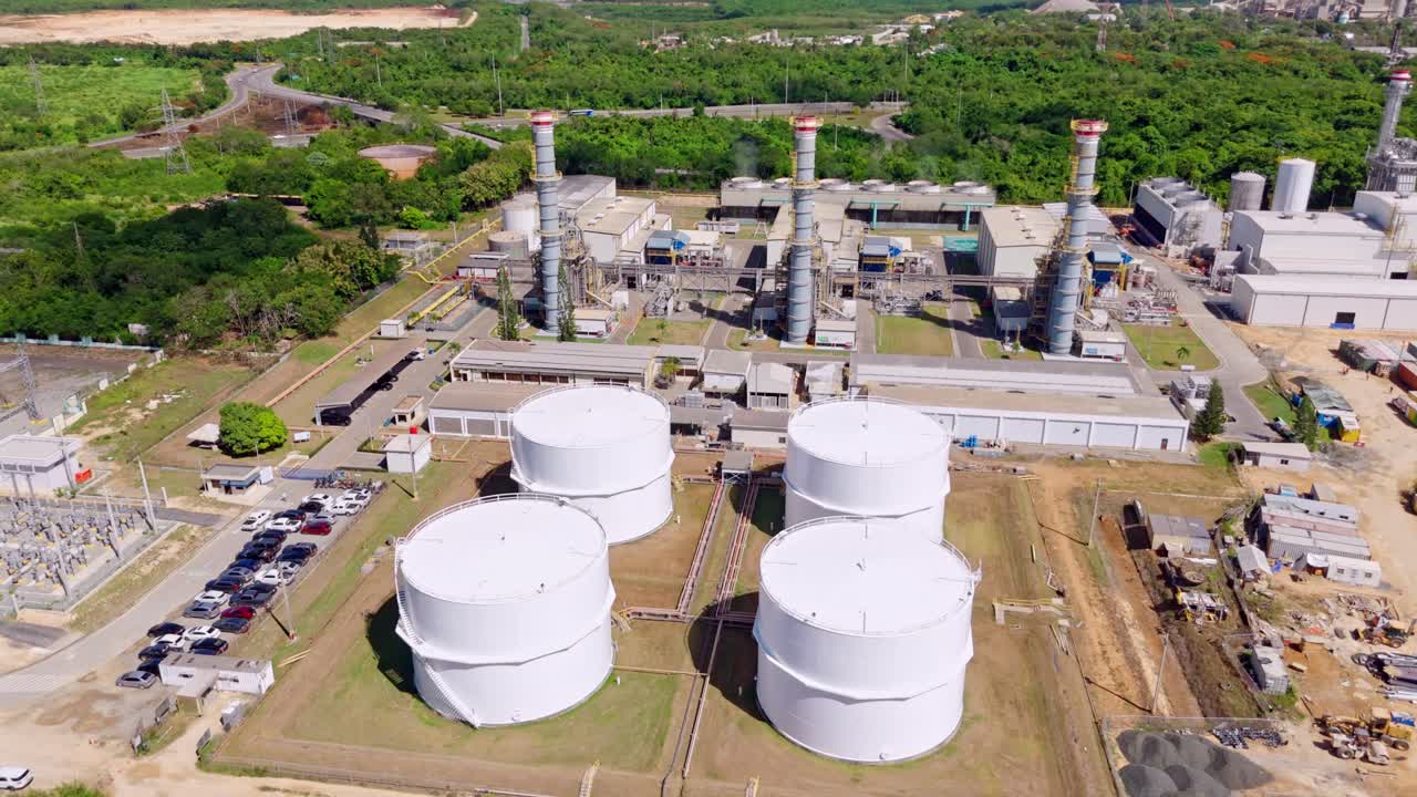 Large Storage Tanks And Complex Infrastructure Of The New Power Generating Plant, Energas IV In San Pedro de Macorís, Dominican Republic. Aerial Shot