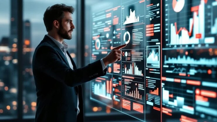 Businessman dressed in a formal suit is engaging with a digital data visualization interface, showcasing various graphs and statistics, creating a modern and innovative office atmosphere