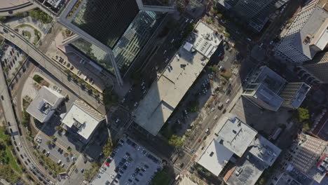 Jacksonville-Florida-Aerial-v14-birdseye-down-shot-of-skyscrapers,-parking-and-traffic-during-daytime---March-2020