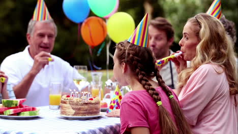 girl blowing birthday candle in cinemagraph