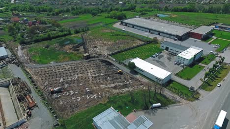 industrial area with construction site and warehouses