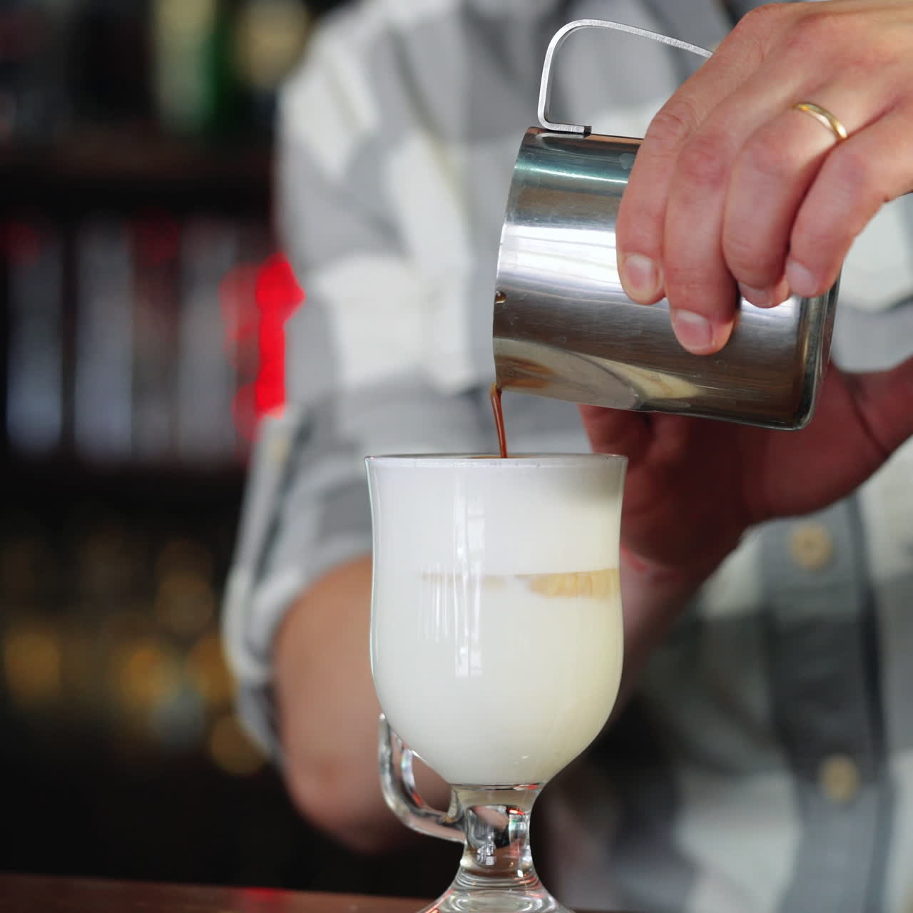 Barista prepares coffee with milk. Latte cup at the Coffee House. Coffee with milk. Sqare video
