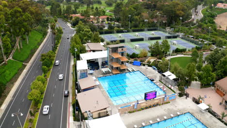 Aerial View of a Large Outdoor Aquatic Center and Sports Complex