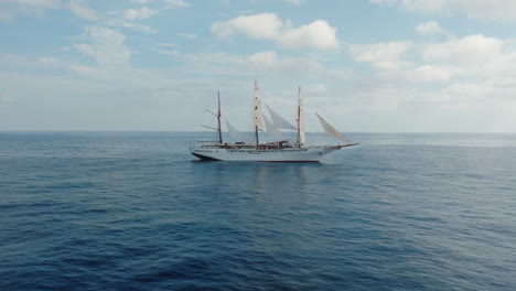 Sea cloud luxury cruise ship sailing vessel in the Atlantic Ocean under clear blue sky, Aerial