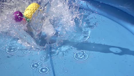 plastic toys splashing on water