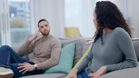 Angry-couple,-fight-or-argue-on-sofa-with-stress