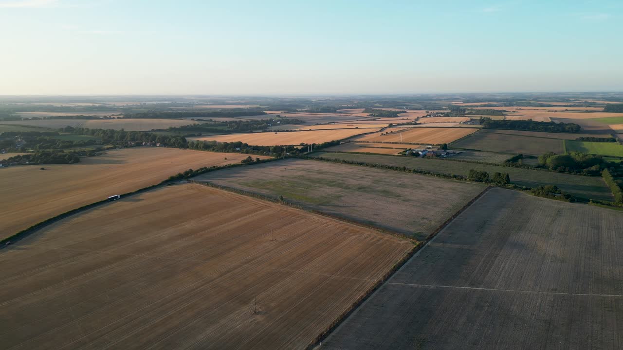 Panning aerial movement about the village of Aylesham agricultural fields, Aylesham, United Kingdom