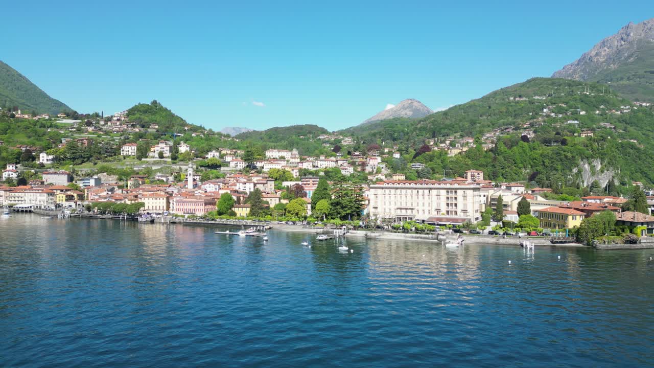 Aerial drone shot over Northern Italy's Lake Como region, showcasing stunning landscapes, charming architecture, and the peaceful atmosphere of Lombardy
