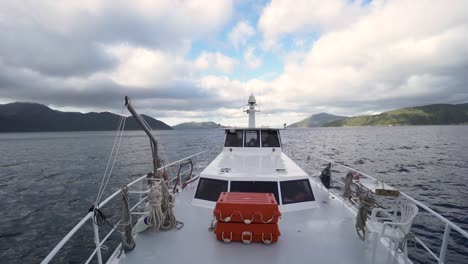 looking back from front deck of boat on ocean in new zealand