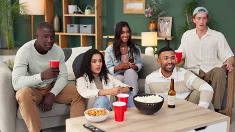 friends watching tv and celebrating together