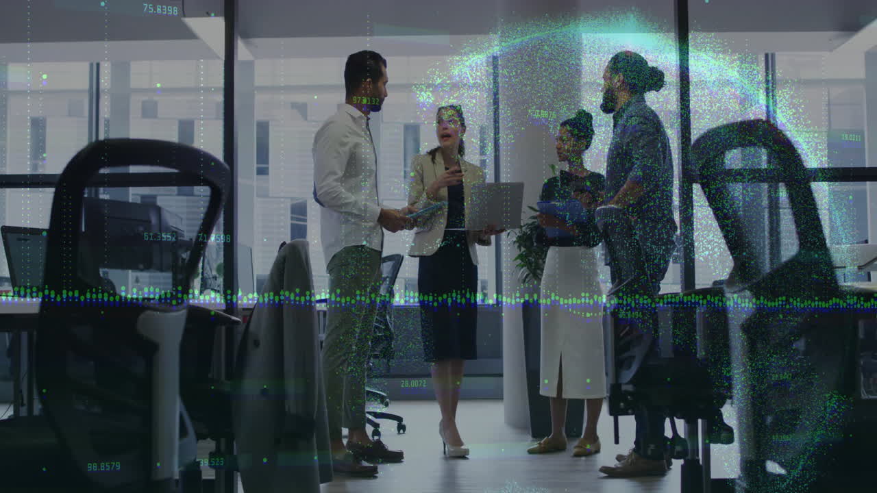 Coworkers collaborating in business office, overlaying data-pulse graphics on laptop and documents