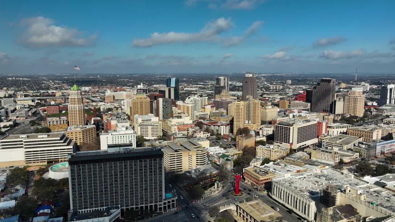 Panoramic drone shot of the San Antonio skyline, sunny evening in Texas, USA